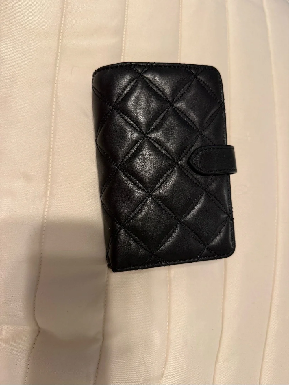 kate spade quilted black leather phone wallet with gold logo